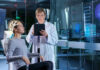 Scientist monitoring brain activity of a patient