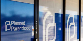 Planned Parenthood office entrance with logo and signs