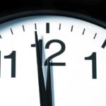 Daylight Saving Time Dangers EXPOSED – Shocking Health Risks Close up of a clock showing the time just before noon