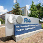 FDA building sign with blue sky background