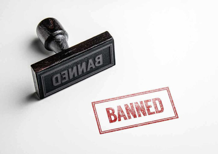 Banned stamp and rubber stamp on white background.