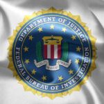 FBI Director’s SHOCKING China Deal Changes Everything FBI seal on a textured background