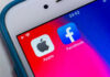 Apple and Facebook apps on smartphone screen