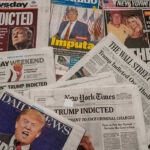 Newspaper headlines about Trumps indictment.