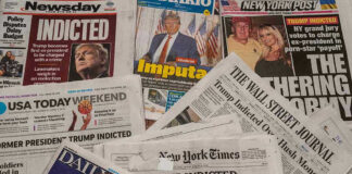 Newspaper headlines about Trumps indictment.