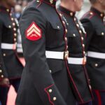 Marines in formal uniforms marching during a parade