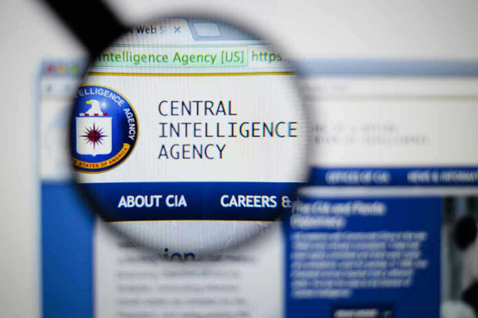 Magnifying glass over Central Intelligence Agency webpage.