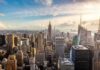 Aerial view of New York City skyline featuring the Empire State Building at sunset