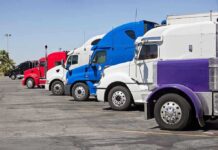 A lineup of colorful trucks parked in a lot