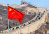 Congress Targets China’s Fentanyl Lifeline Chinese flag by the Great Wall of China.