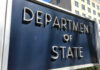 Vance vs Obama: Same Play, New Twist? Department of State sign in front of building.