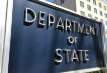 Vance vs Obama: Same Play, New Twist? Department of State sign in front of building.