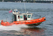 Coast Guard Fires Shots at Fleeing Boat Coast Guard boat speeding on the water.