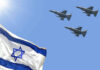 Hezbollah Pause, American Stakes Explode Israeli flag with three fighter jets flying overhead.