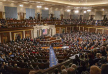 Senate Showdown Over Voting Explodes- ‘The Senate Sucks’ Large assembly in a government legislative chamber.