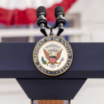 Democrats Meltdown After Trump’s Iran Deal Vice Presidential podium with microphones and emblem.