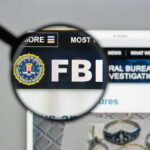 Staggering FBI Rescue Claim—Where’s The Proof? FBI website shown through magnifying glass.