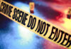 Crime scene tape with do not enter text.