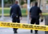 Impostor Panic: DEA Badge, Guns, Chemicals Police officers walking past caution tape at a crime scene