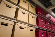 FBI Purge Over Anti-Catholic Memo Shelves filled with brown and red storage boxes for organizing documents