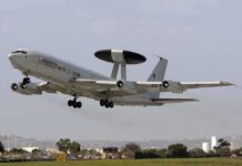Trump Yanks Firepower, Allies Scramble NATO AWACS aircraft taking off from an airfield