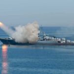 Gulf Sirens Scream As Barrage Begins A military ship launching a missile into the ocean