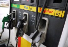 Trump Threatens Pump Price Crackdown Close-up of a fuel pump with diesel and gasoline options