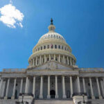 Congress Picks Which Grief Matters U.S. Capitol building against a clear blue sky.