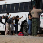 Kansas City Trafficking Sting: Numbers Stun Border patrol officers investigating people near a bus.