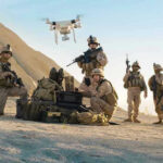 Jordan Skies Light Up — What Got Hit? Soldiers operating a drone in a desert environment.