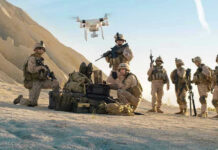 Jordan Skies Light Up — What Got Hit? Soldiers operating a drone in a desert environment.