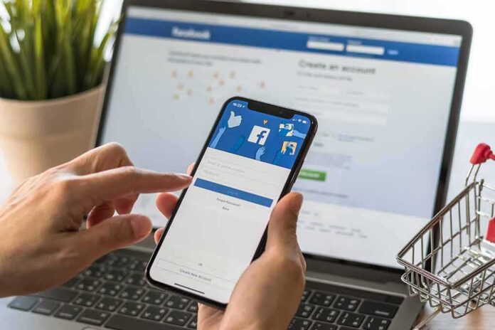 Hands using a smartphone with a social media login screen
