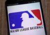 Major League Baseball logo on a smartphone screen