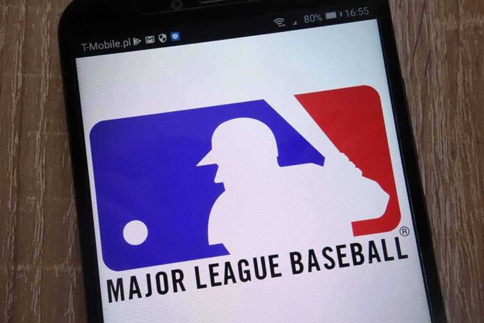 shutterstock_1181883586 Major League Baseball logo on a smartphone screen
