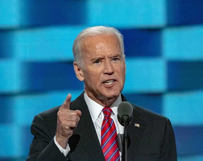 Man in suit speaking at a podium