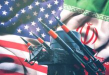 Iran Strikes Jordan Base — Americans Dead Missile launchers in front of U.S. and Iranian flags