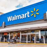 Shrinkflation Exposed At Walmart Exterior view of a Walmart store with customers entering