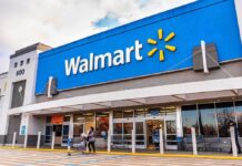 Shrinkflation Exposed At Walmart Exterior view of a Walmart store with customers entering