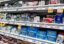Pharmacy shelf with over-the-counter pain relievers