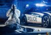 forensic investigator photographing crime scene near police car