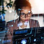 Navy’s $1M Brain Game Raises Eyebrows A woman analyzing data on a futuristic digital interface
