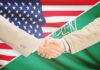 Nuclear Gamble With Riyadh Handshake between two people over U.S. and Saudi flags