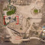 Aerial view through drone HUD of archaeological ruins and surrounding campsite
