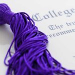 Culture War Engulfs Campus — Trust Collapses Close-up of a purple graduation tassel next to a diploma