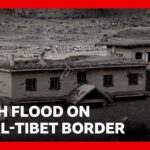 Hundreds missing after deadly flash flood on Nepal-Tibet border | BBC News