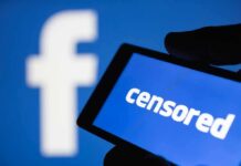 Judge SLAMS Meta: Nearly $1B Hit smartphone screen showing the word censored against a blue social media logo backdrop