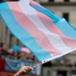 Conservative Gay Group Ditches Trans Push Transgender pride flag waving at a parade