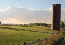 Mental Health Twist Shocks Trump Golf Case Brick silo beside a golf course at sunset