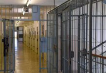 Illinois Says No — Inmate Dies Days Later Prison corridor with barred doors