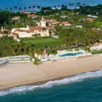 Kamala Harris 8-Million Malibu Purchase Aerial view of a beachfront estate with pool and palm trees